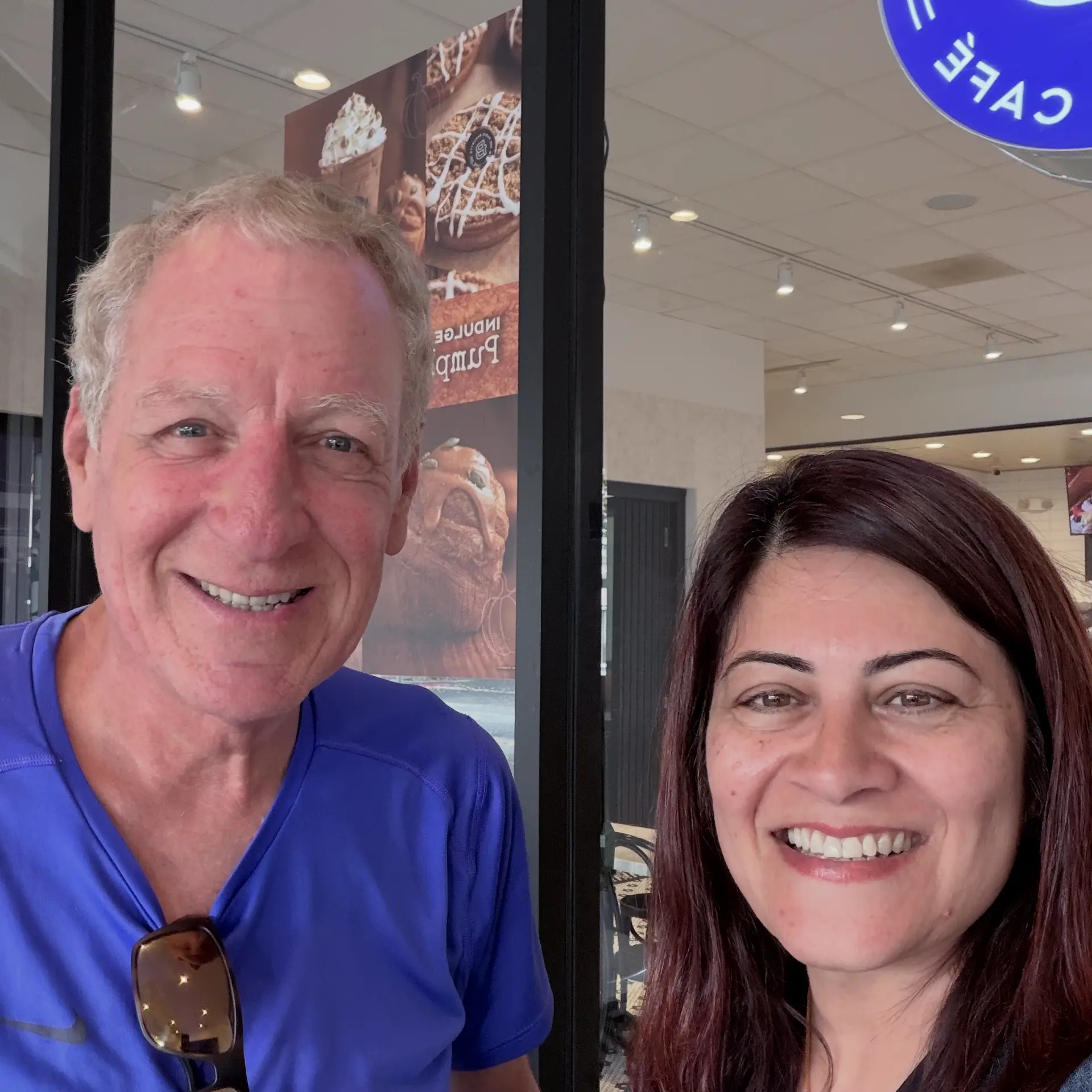 Megha Chawla with a San Carlos neighbor at a local cafe